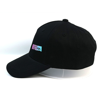 Chapeau de casquettes de baseball imprimé par caoutchouc noir solide fait sur commande pour des garçons et des filles
